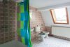 EIN-ZWEIFAMILIENHAUS mit Einliegerwohnung, Scheune und großem Grundstück - Badezimmer OG